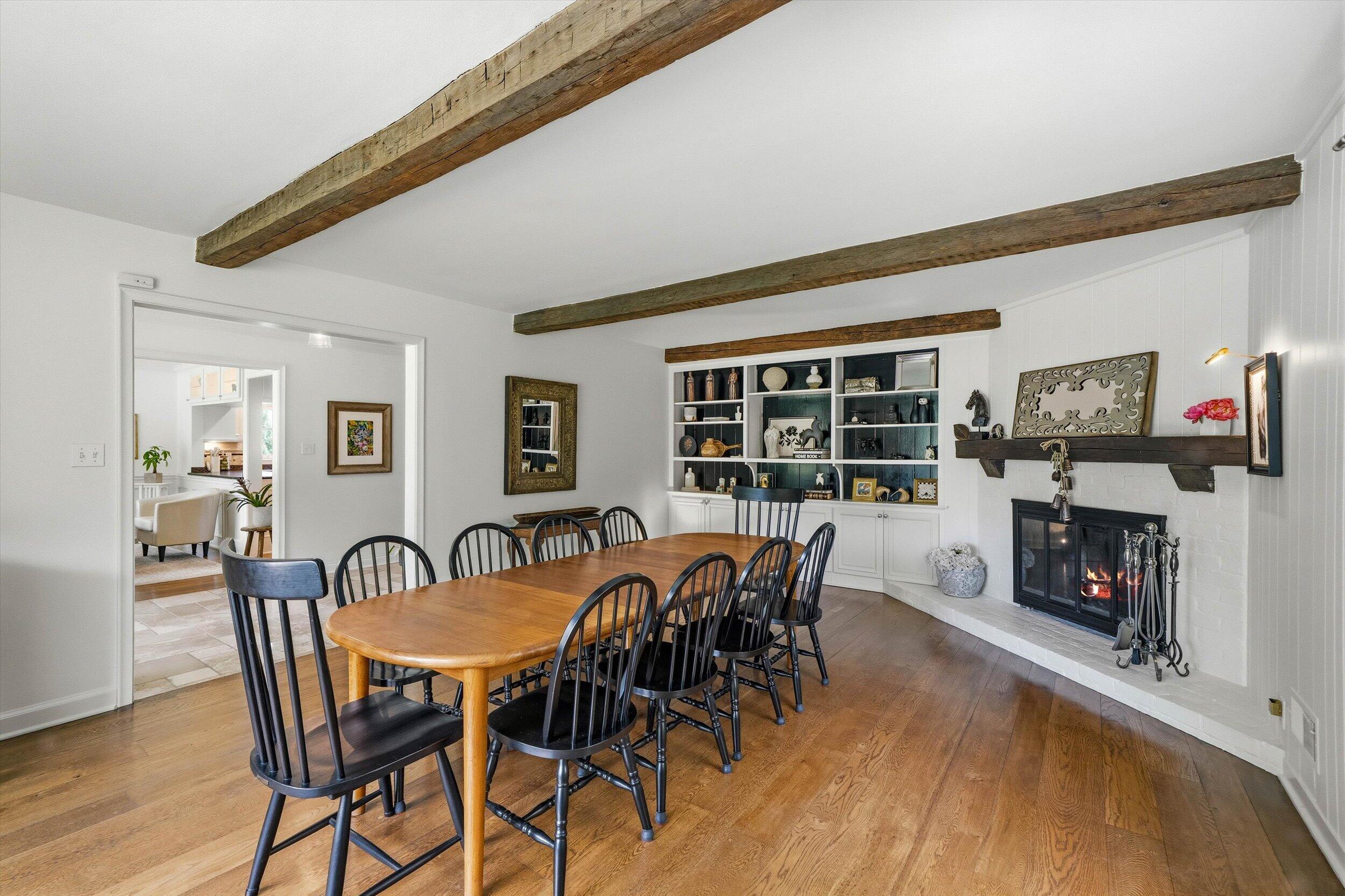 9431 Hawthorne Road Mequon, WI 53097 - Photo 12 of 67 Natural fireplace in dining room