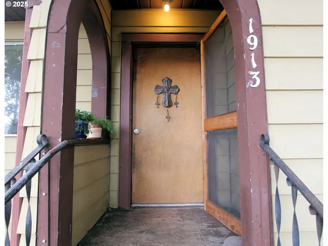 a view of hallway with windows
