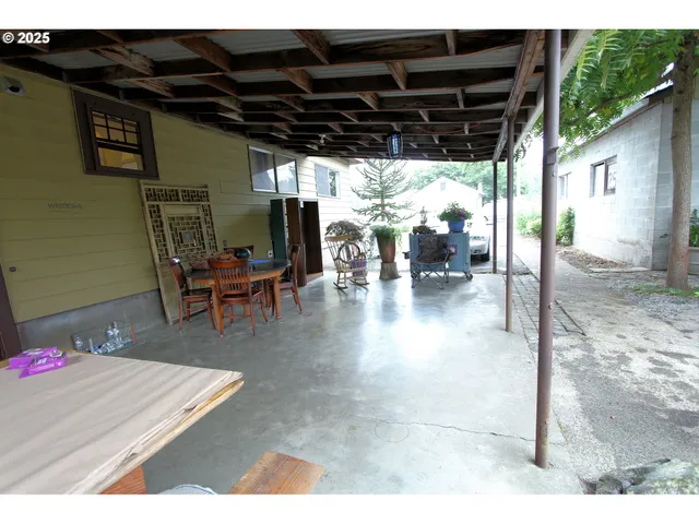 a view of yard with patio