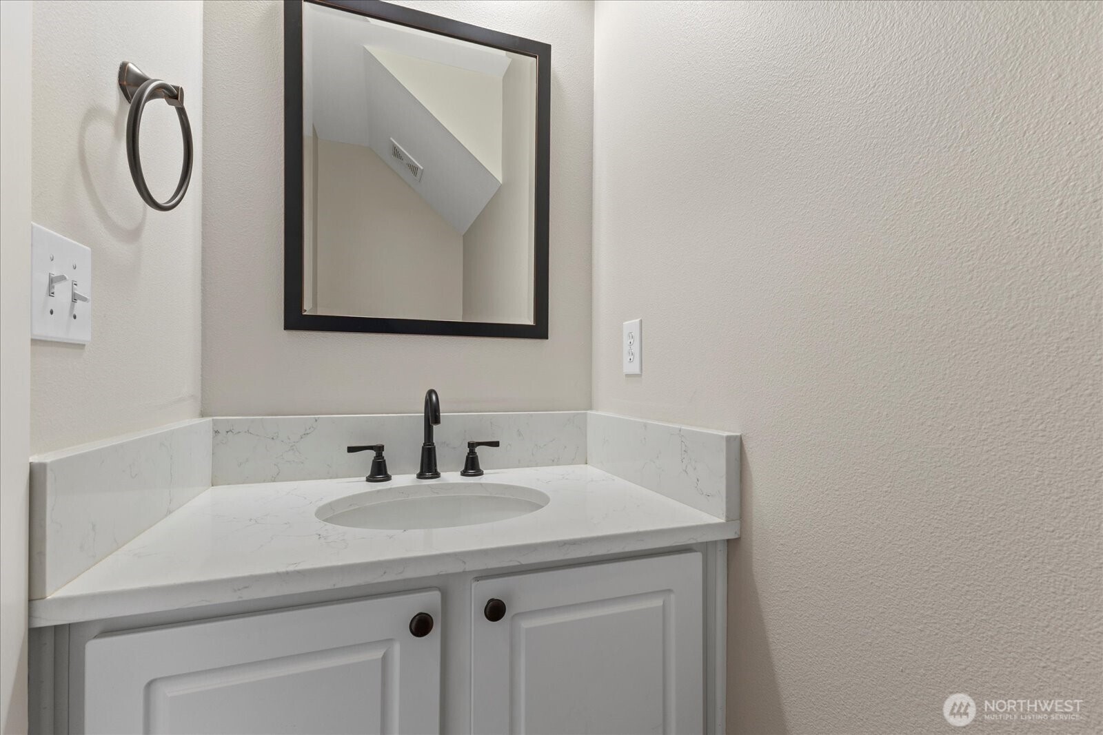 14912 48th Avenue Southeast Bothell, WA 98012 - Photo 15 of 40 a bathroom with a granite countertop sink and a mirror