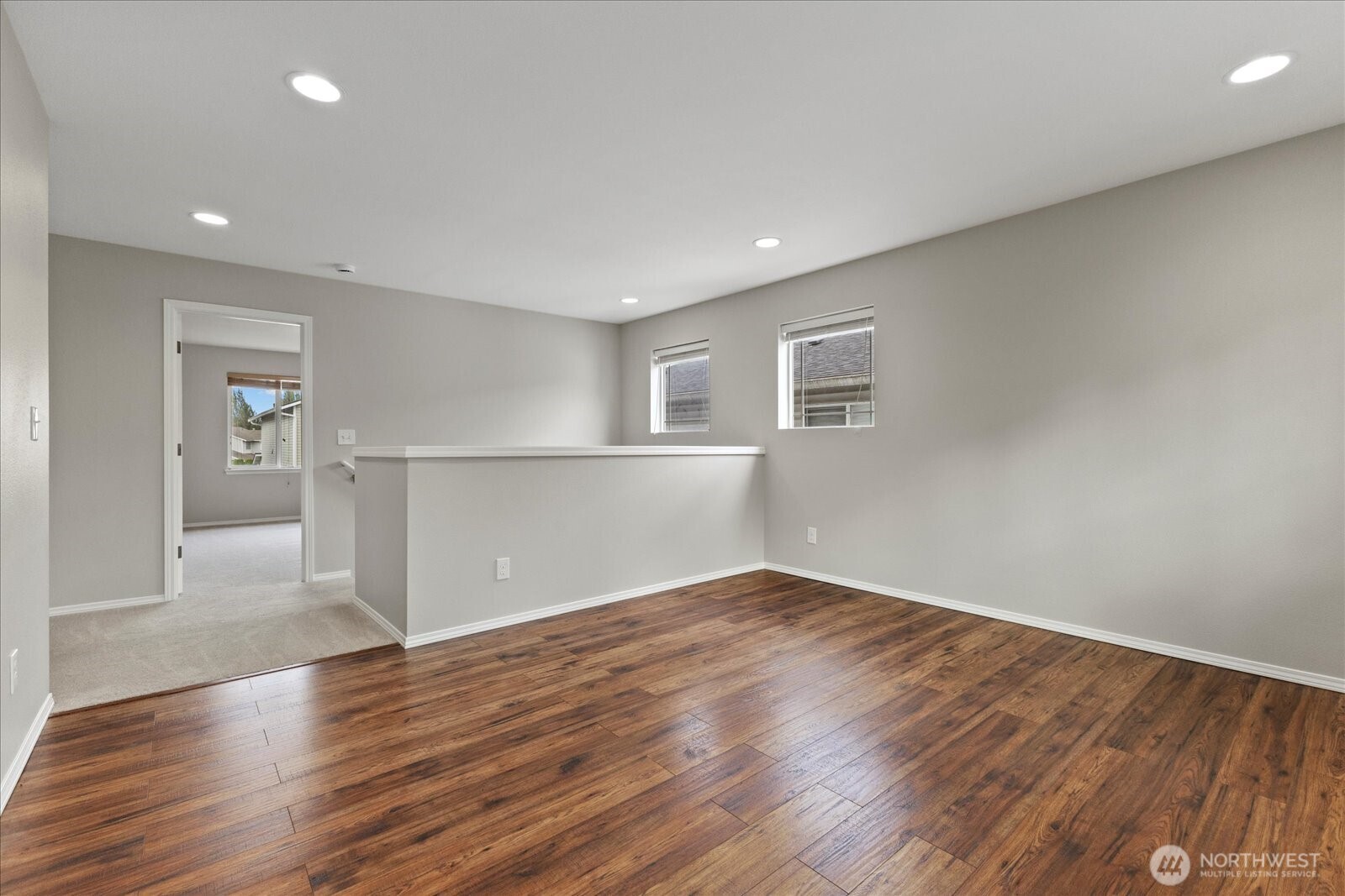14912 48th Avenue Southeast Bothell, WA 98012 - Photo 17 of 40 a view of empty room with wooden floor