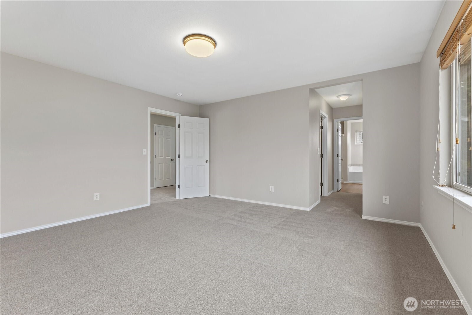 14912 48th Avenue Southeast Bothell, WA 98012 - Photo 24 of 40 an empty room with windows and closet