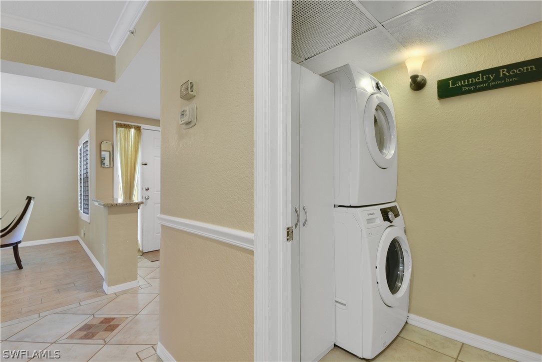 6838 Lantana Bridge Road, Unit 102 Naples, FL 34109 - Photo 22 of 34 a bathroom with a shower