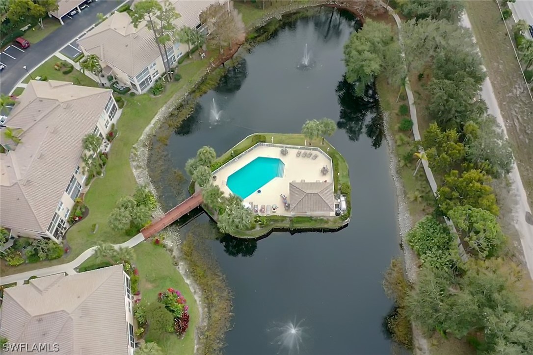 6838 Lantana Bridge Road, Unit 102 Naples, FL 34109 - Photo 26 of 34 an aerial view of a house