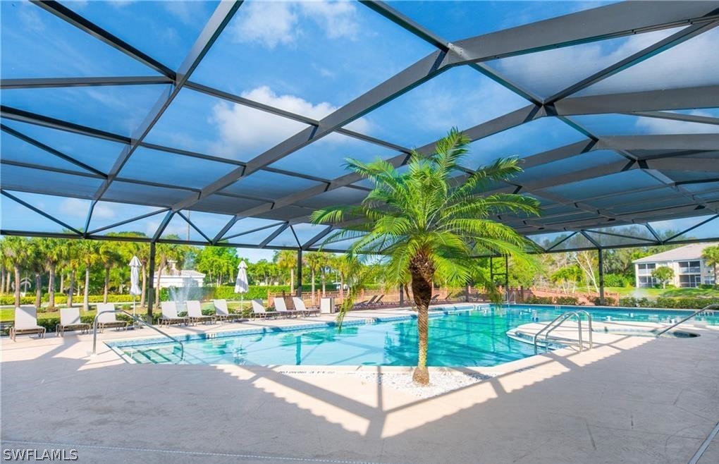 6838 Lantana Bridge Road, Unit 102 Naples, FL 34109 - Photo 33 of 34 a view of yard with sitting area