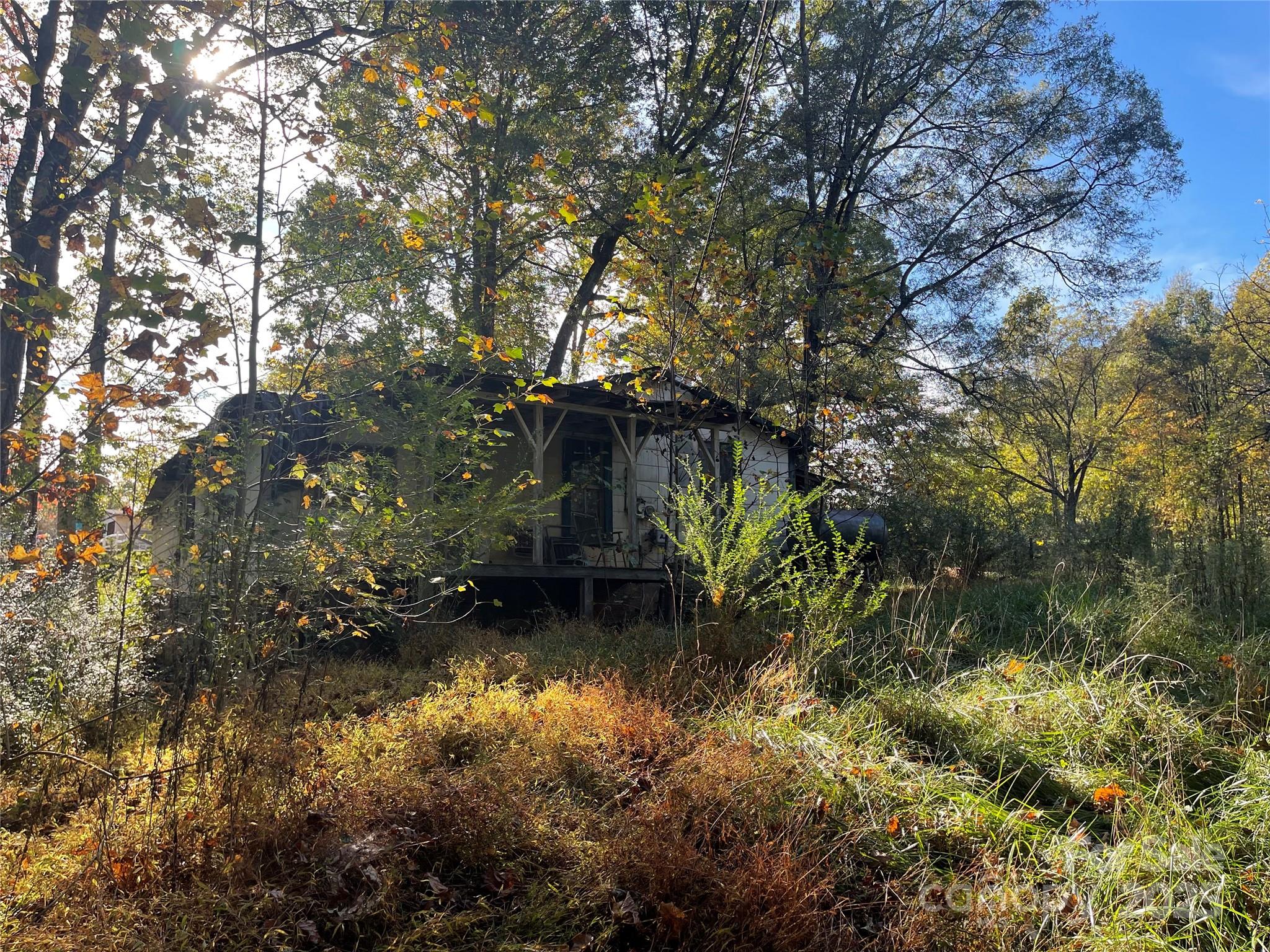 137 Stacy Road Mooresville, NC 28115 - Photo 3 of 9 a backyard of a house with lots of green space