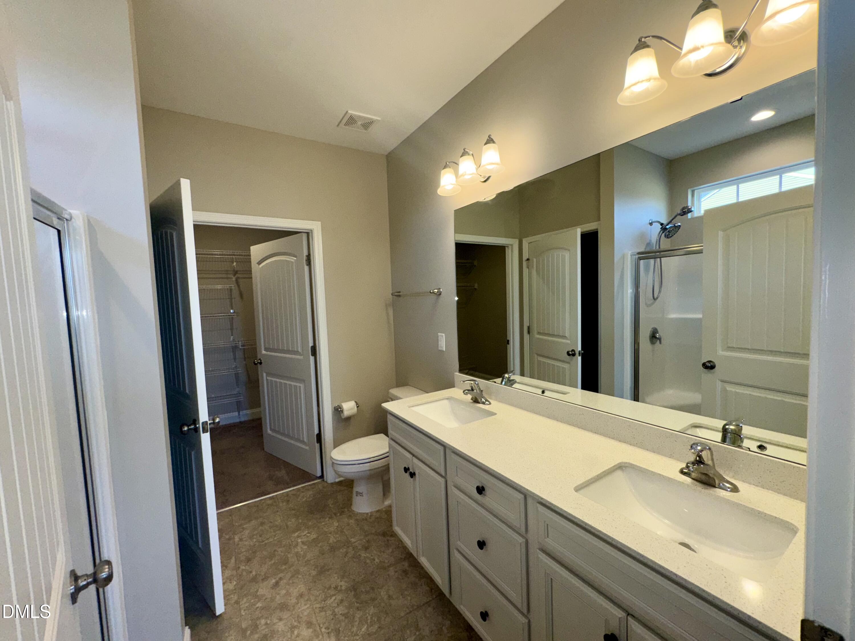 1946 Payne Road Haw River, NC 27258 - Photo 13 of 18 a bathroom with a granite countertop sink mirror and double