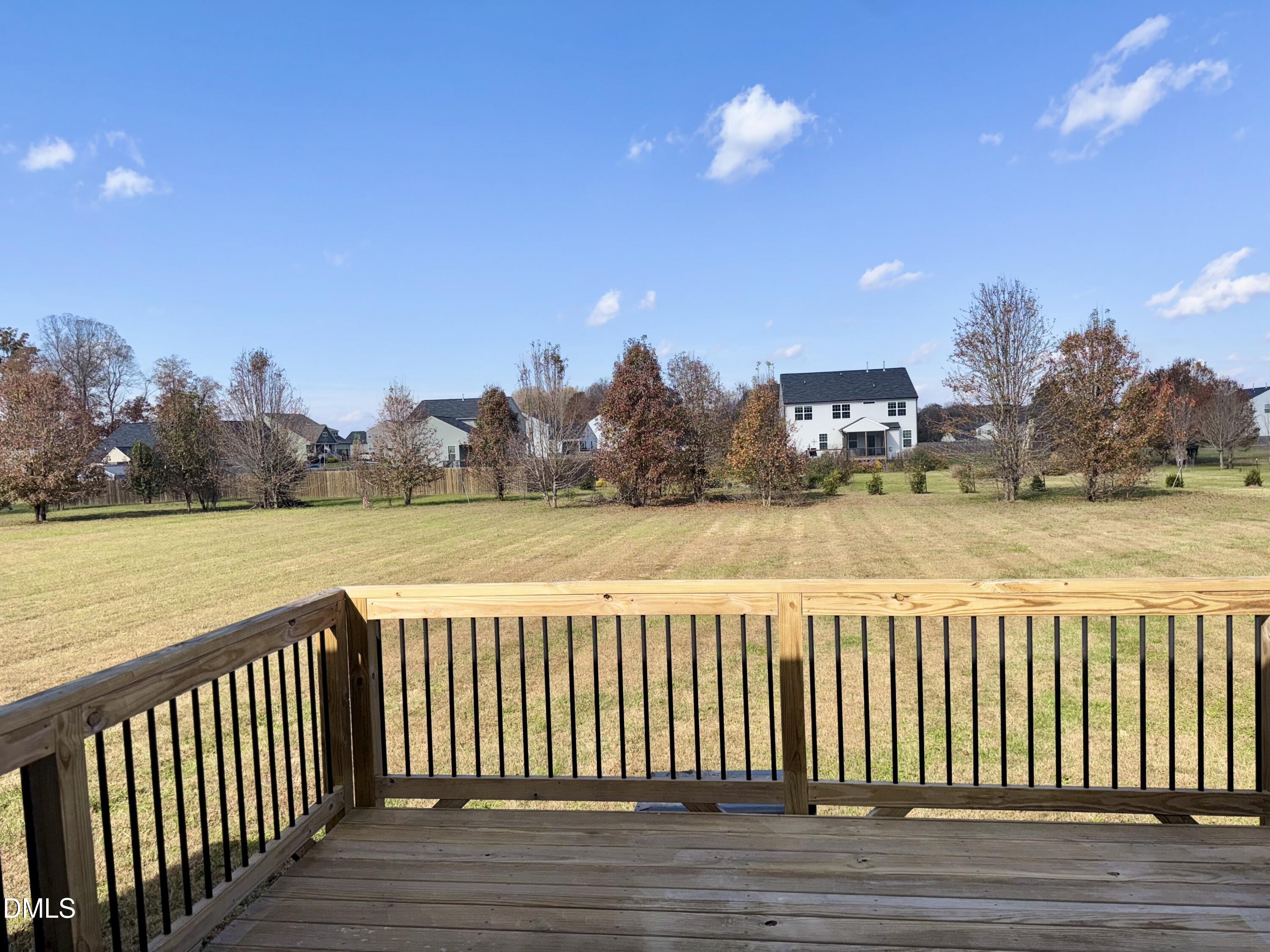 1946 Payne Road Haw River, NC 27258 - Photo 18 of 18 a view of a balcony with a floor to ceiling window and wooden fence