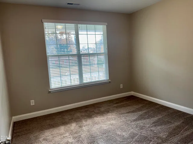 a view of a room with a window