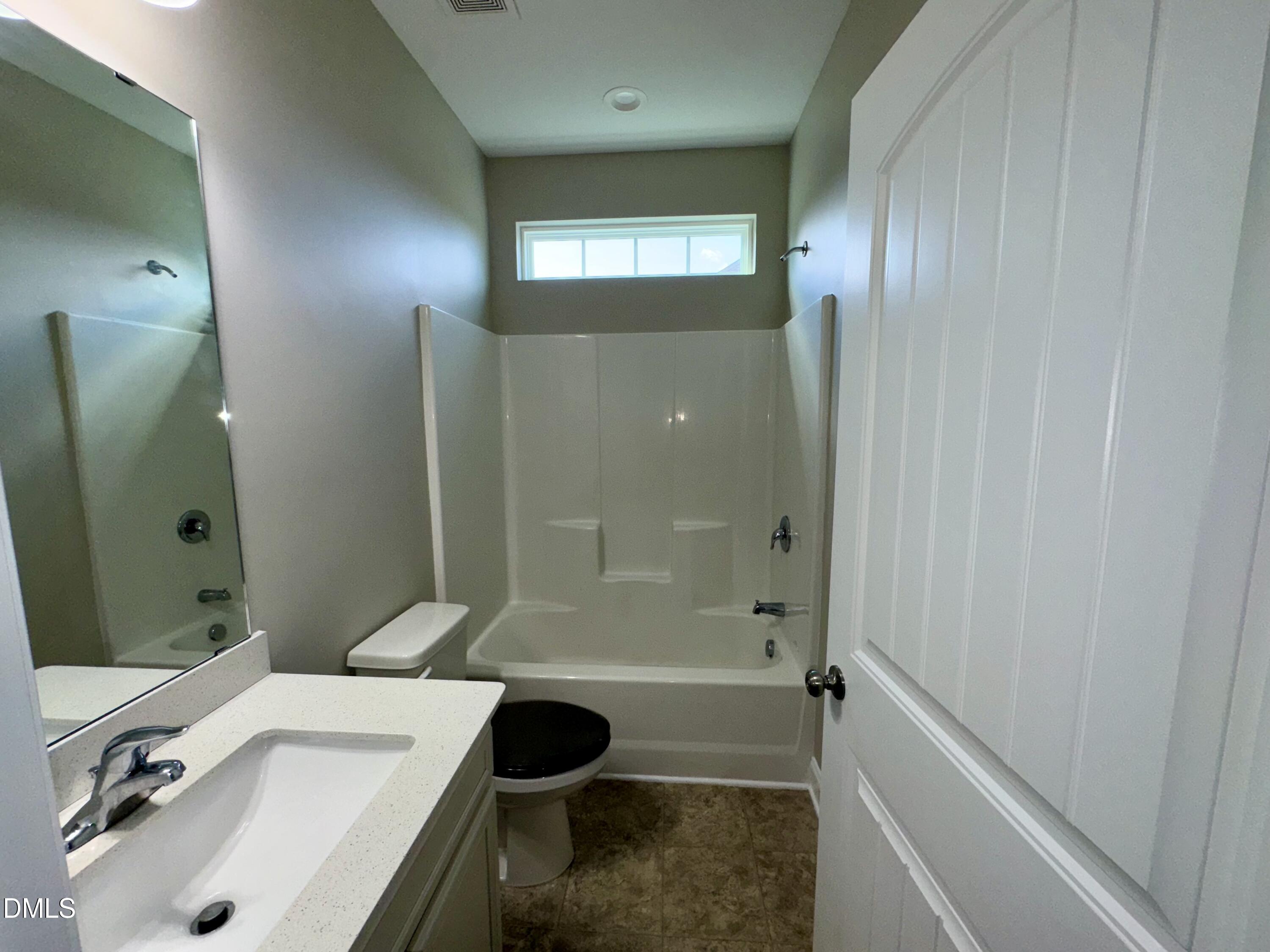 1946 Payne Road Haw River, NC 27258 - Photo 4 of 18 a bathroom with a sink and a tub