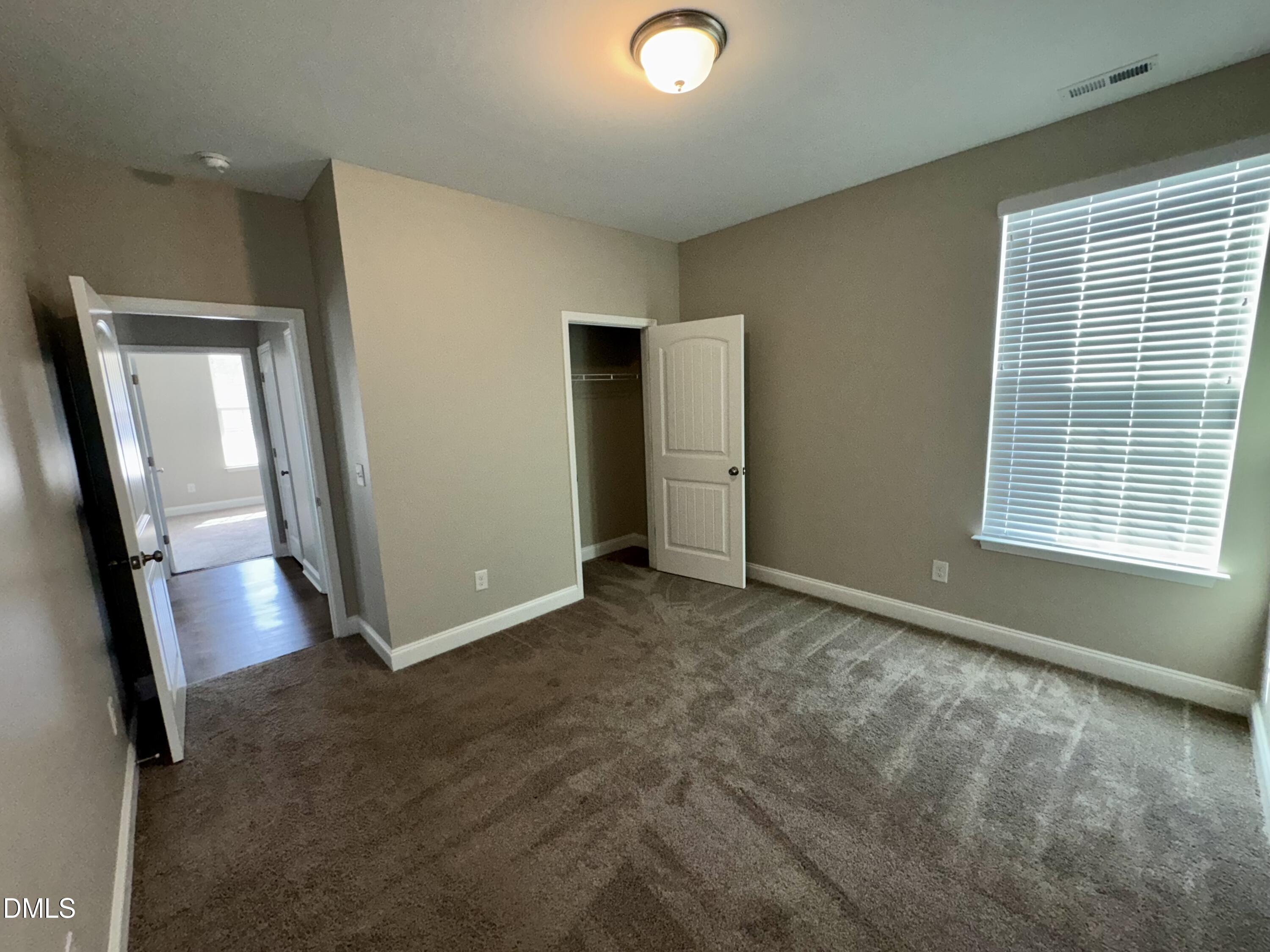 1946 Payne Road Haw River, NC 27258 - Photo 5 of 18 an empty room with windows and entrance
