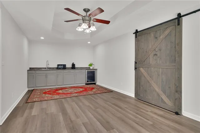 a view of a hallway with a chandelier