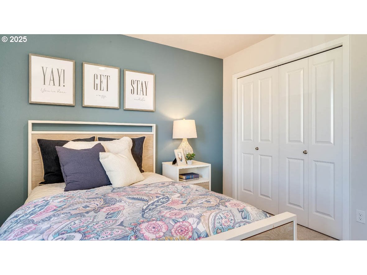 2343 30th Place Springfield, OR 97477 - Photo 18 of 29 a bedroom with a bed and a painting
