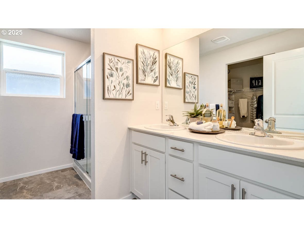 2343 30th Place Springfield, OR 97477 - Photo 24 of 29 a bathroom with a sink and mirror
