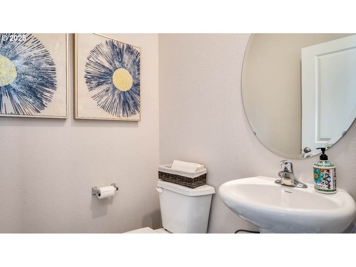 2343 30th Place Springfield, OR 97477 - Photo 3 of 29 a bathroom with a sink and a mirror