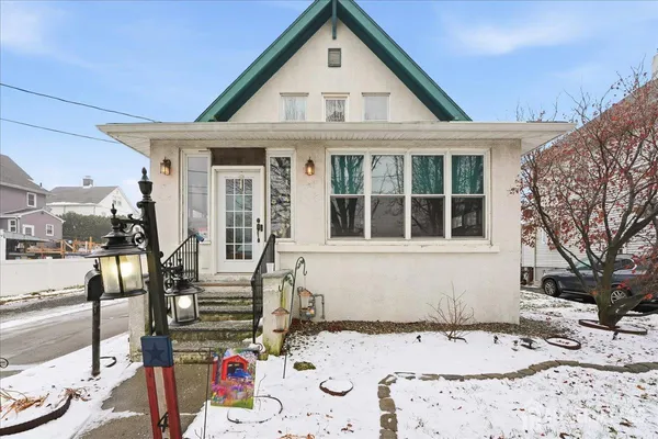 a front view of a house with patio