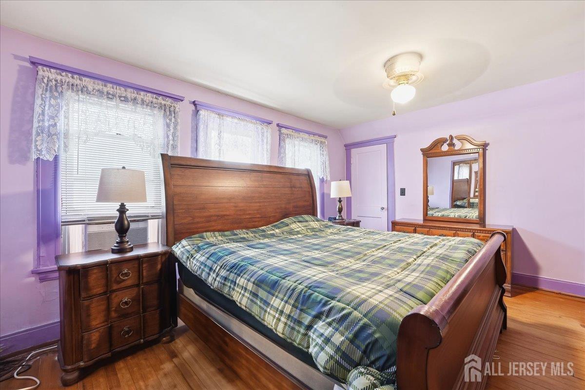 48 Bloomfield Avenue Edison, NJ 08837 - Photo 11 of 21 a bedroom with a bed and a dresser