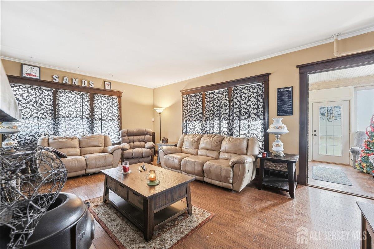 48 Bloomfield Avenue Edison, NJ 08837 - Photo 5 of 21 a living room with furniture and a large window