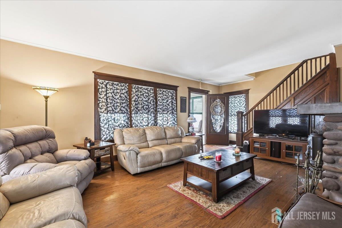 48 Bloomfield Avenue Edison, NJ 08837 - Photo 6 of 21 a living room with furniture and a large window