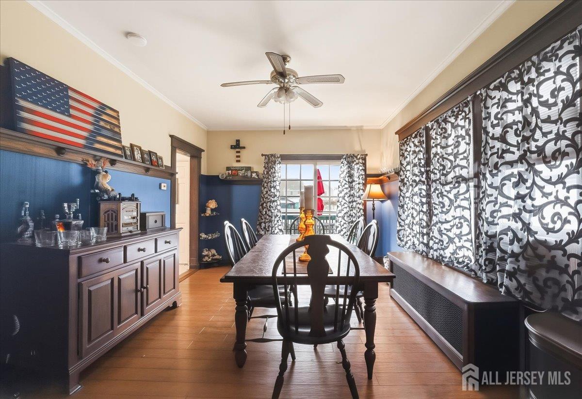 48 Bloomfield Avenue Edison, NJ 08837 - Photo 7 of 21 a view of a dining room with furniture window and wooden floor