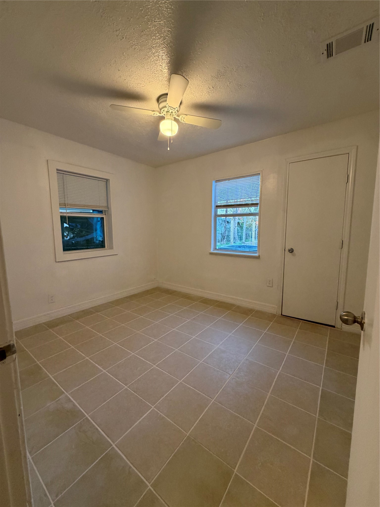 8308 Lenore Street Houston, TX 77017 - Photo 11 of 23 Primary bedroom with ceiling fan.