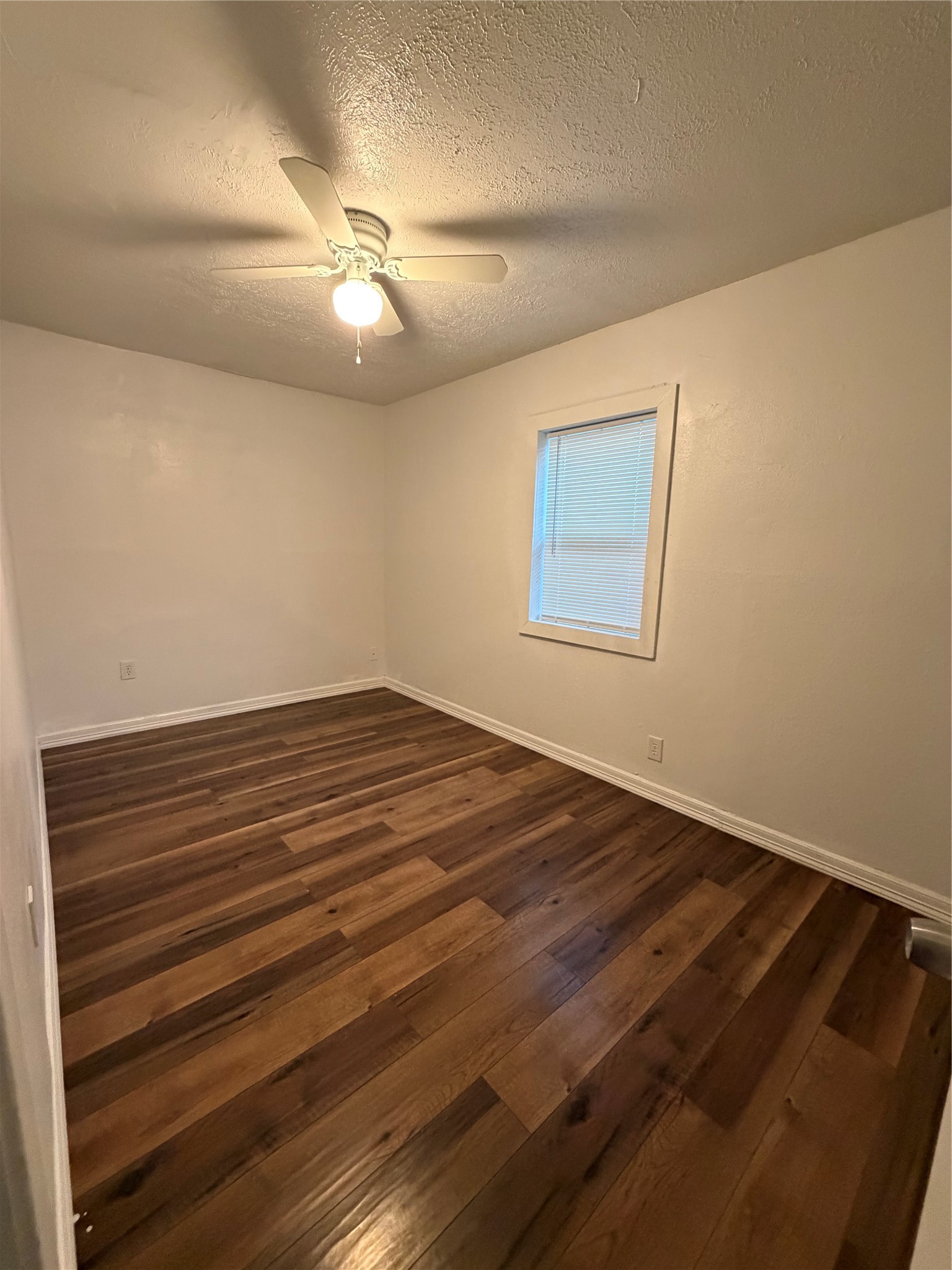8308 Lenore Street Houston, TX 77017 - Photo 13 of 23 Second bedroom with ceiling fan.
