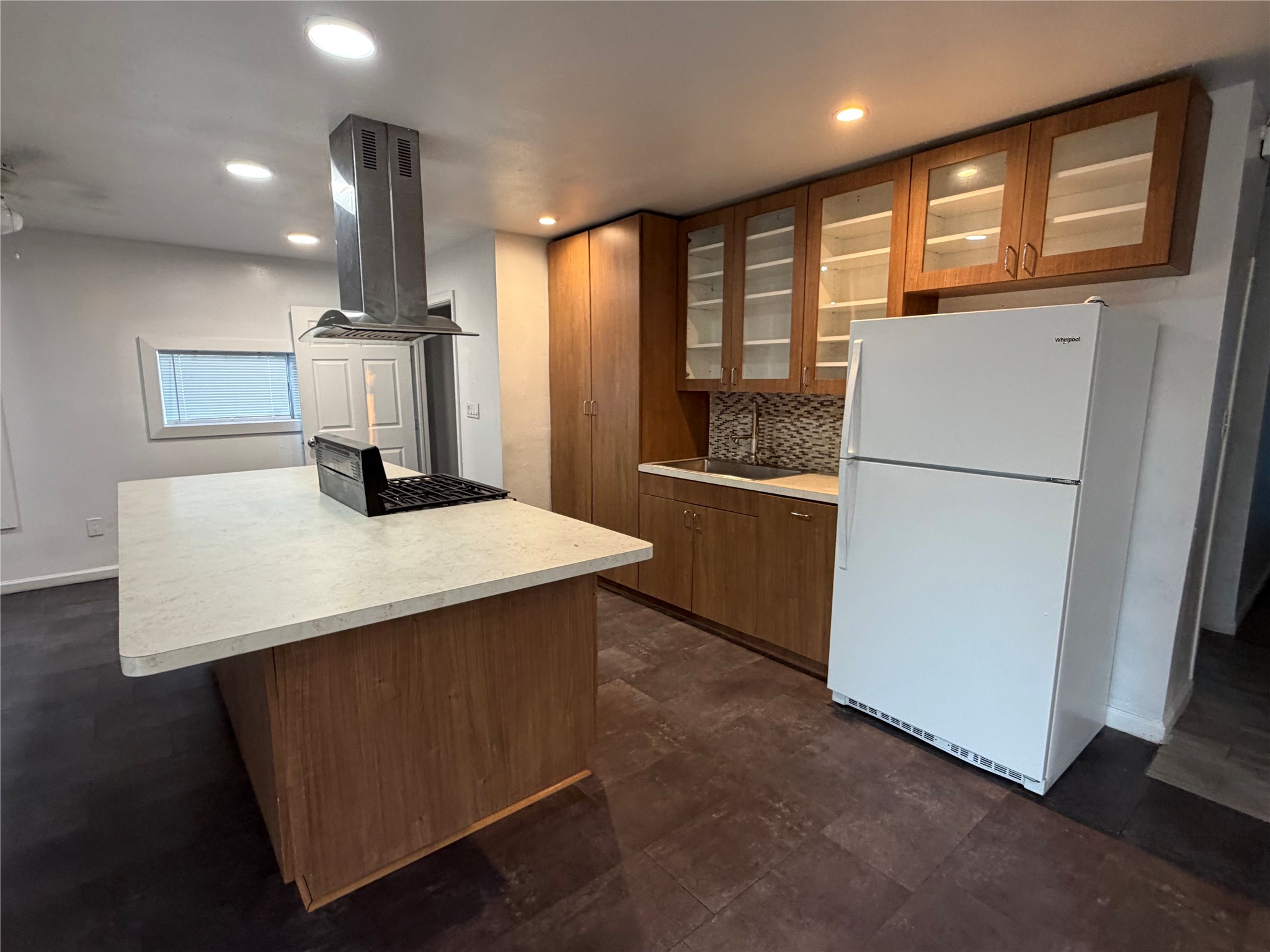 8308 Lenore Street Houston, TX 77017 - Photo 7 of 23 Spacious island with ample counter and seating space with custom cabinets throughout the kitchen.