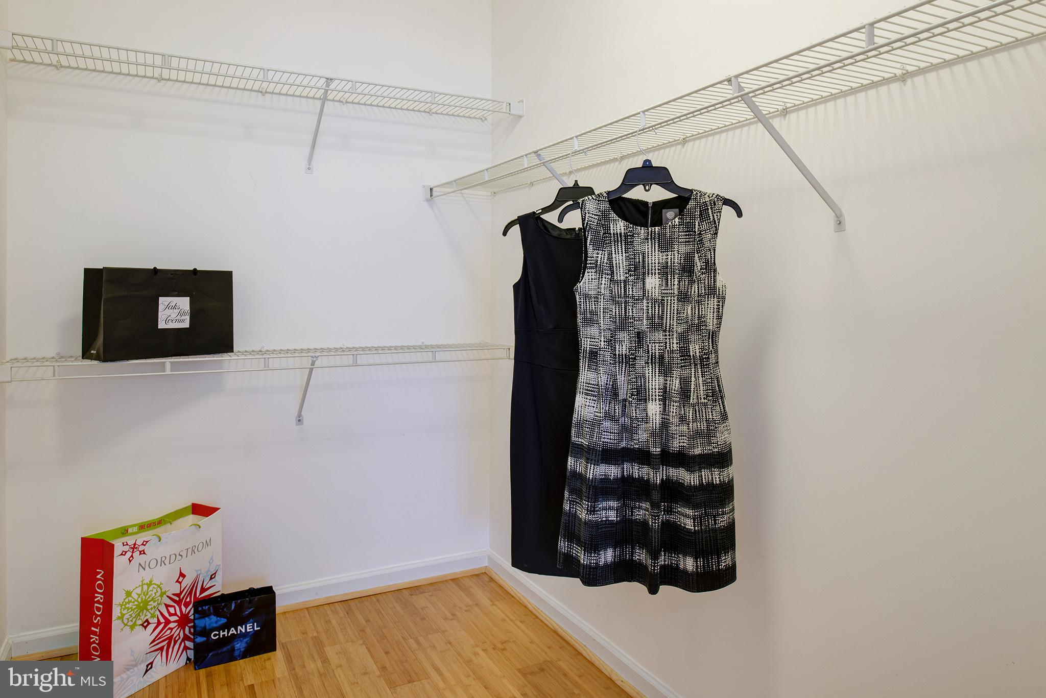 12012 Taliesin Place, Unit 14 Reston, VA 20190 - Photo 13 of 30 GENEROUS SIZED WALK IN CLOSET & LINEN BEHIND DOOR