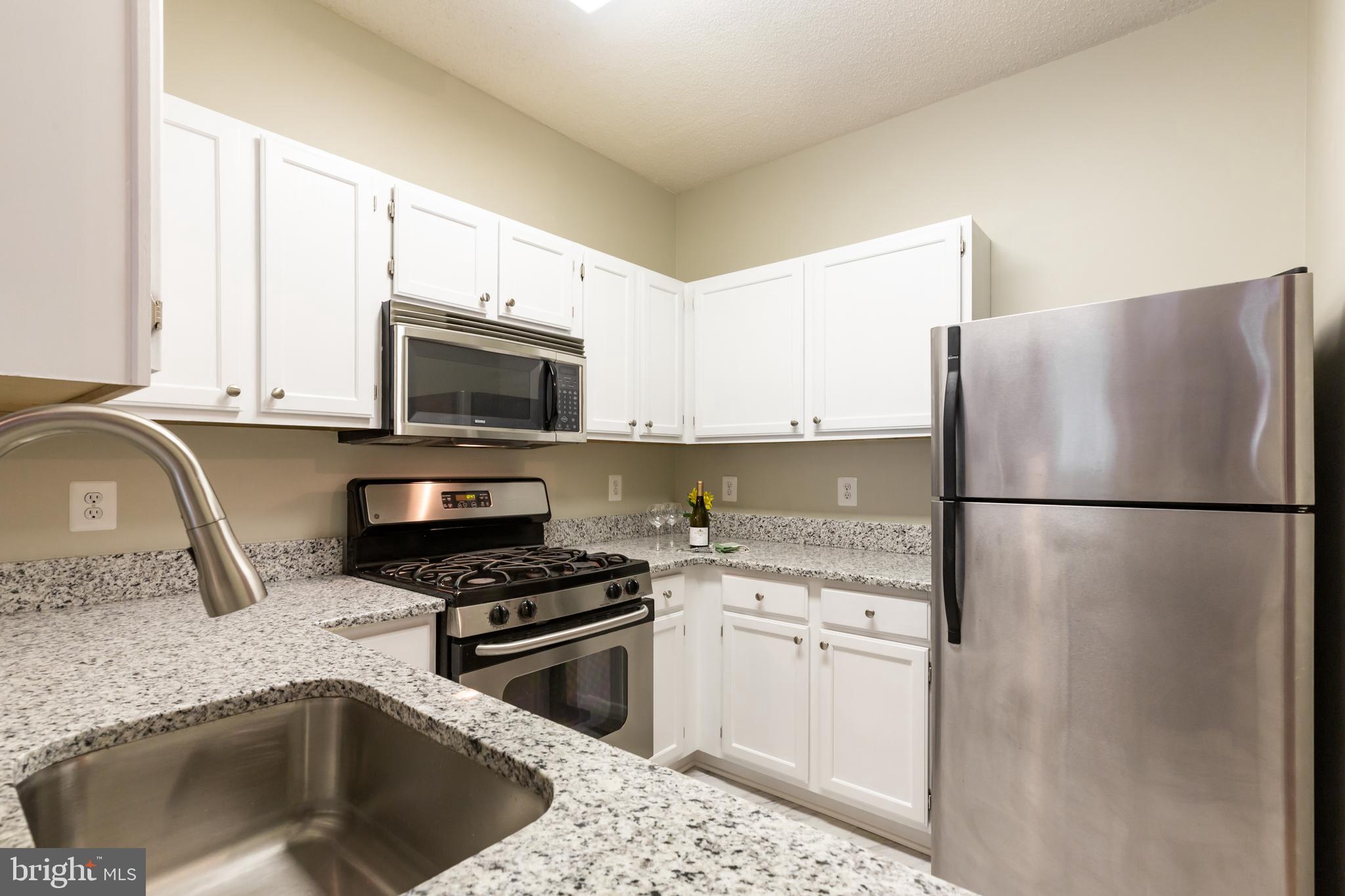 12012 Taliesin Place, Unit 14 Reston, VA 20190 - Photo 3 of 30 RENOVATED KITCHEN! NEW DEEP BOWL SINK & FAUCET