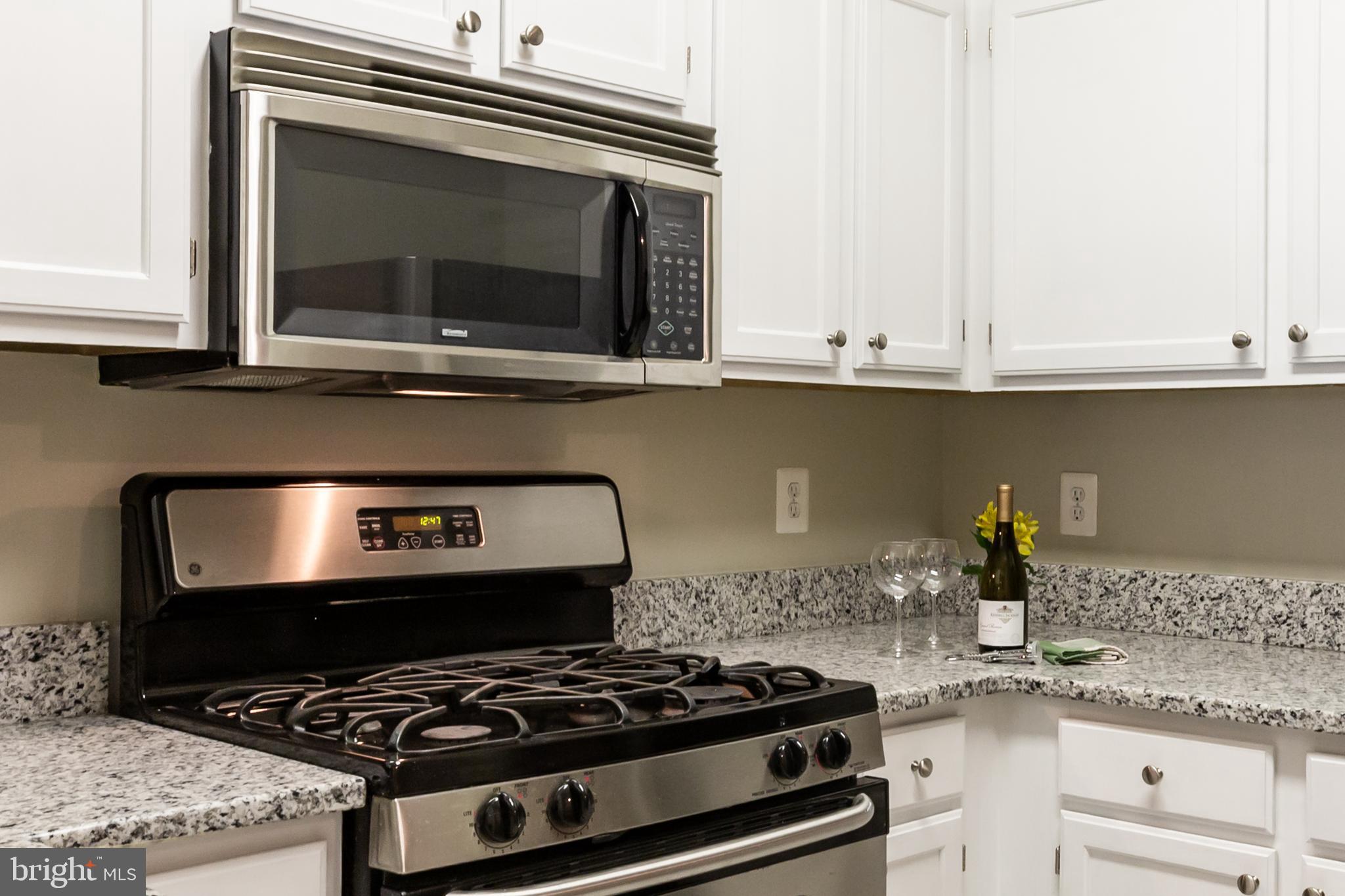 12012 Taliesin Place, Unit 14 Reston, VA 20190 - Photo 4 of 30 STAINLESS STEEL APPL W/GAS STOVE & BUILT IN MICRO