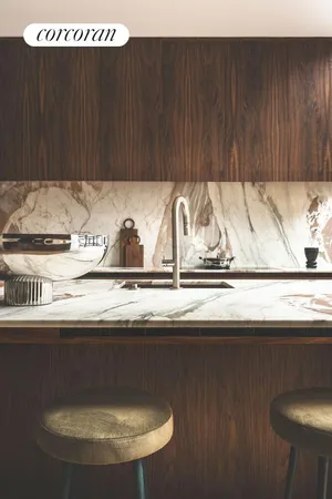 a view of wooden cabinets and a wooden floor