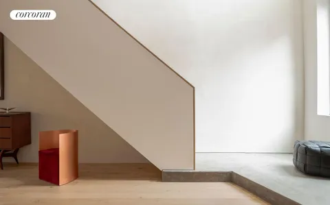 a view of a hallway with staircase