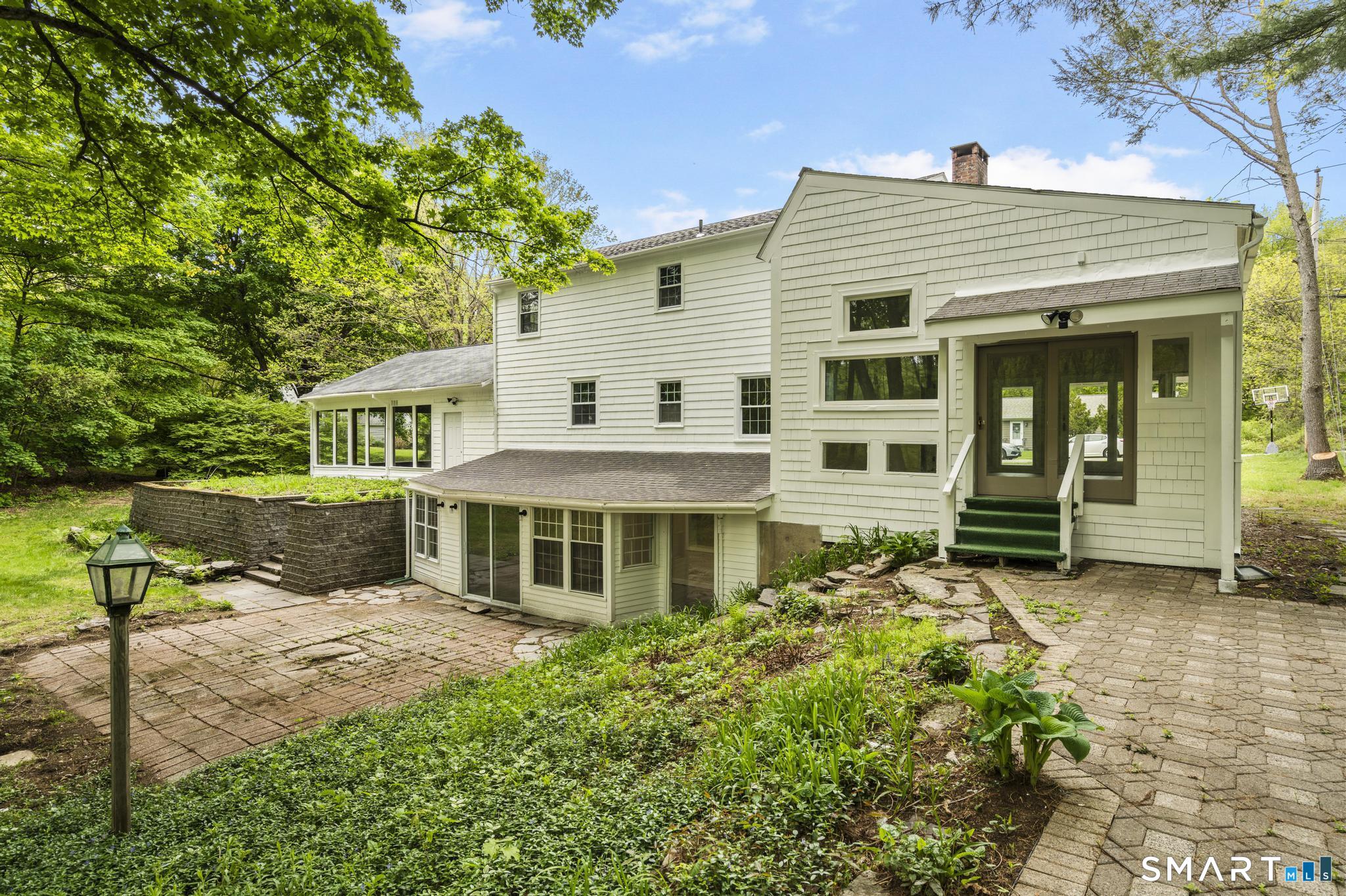7 Sycamore Terrace Windham, CT 06280 - Photo 36 of 40 front view of a house with a garden