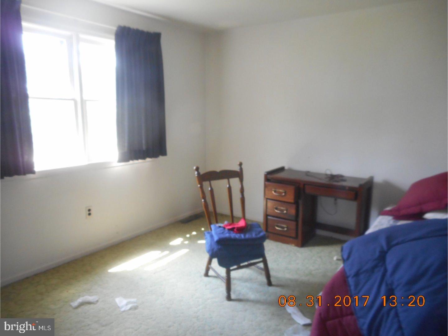 6 Valley Forge Road New Castle, DE 19720 - Photo 12 of 13 a living room with furniture and a window