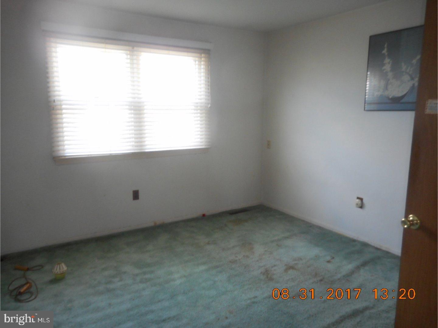 6 Valley Forge Road New Castle, DE 19720 - Photo 13 of 13 an empty room with a window