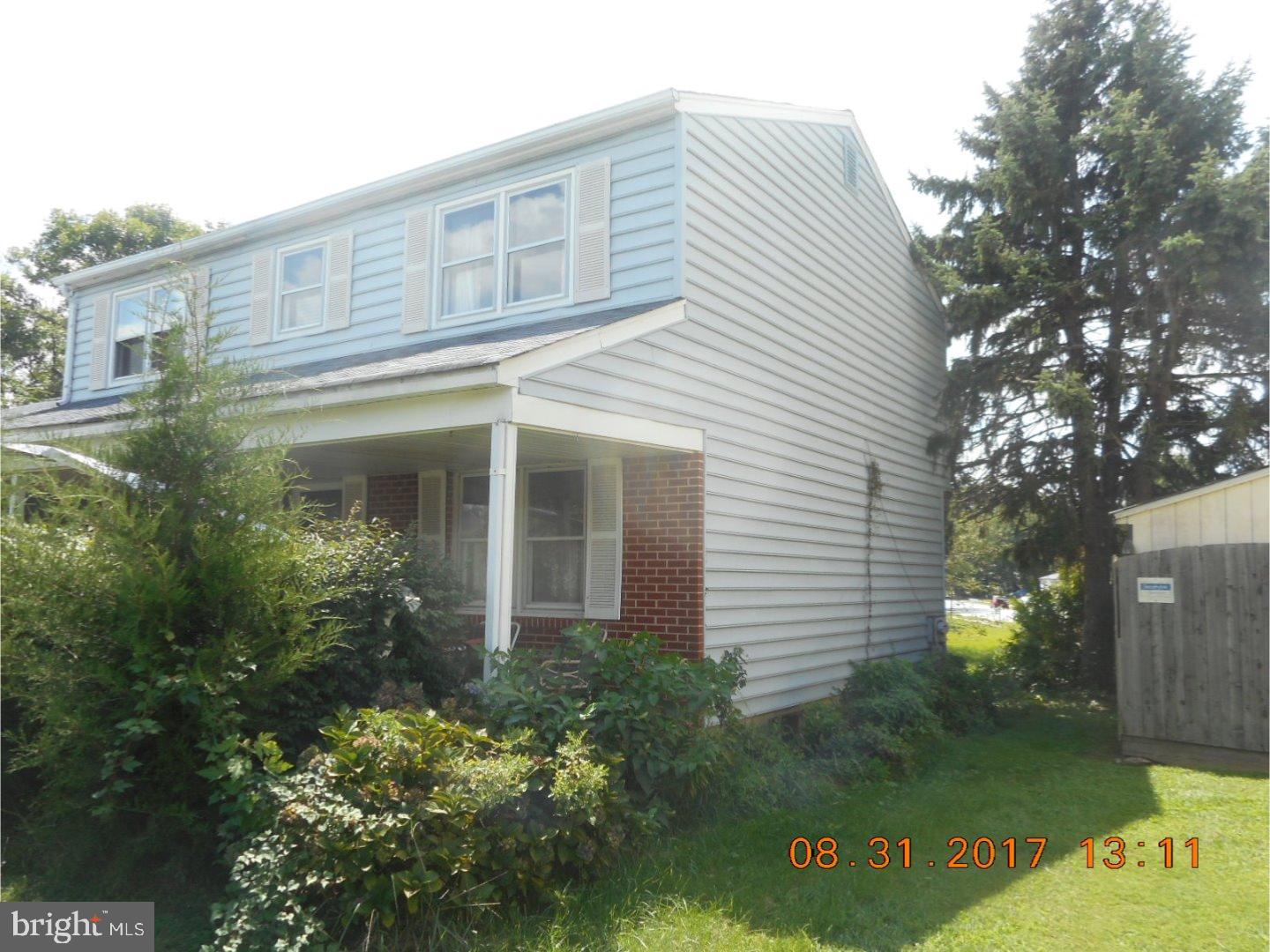 6 Valley Forge Road New Castle, DE 19720 - Photo 3 of 13 front view of a house with a garden
