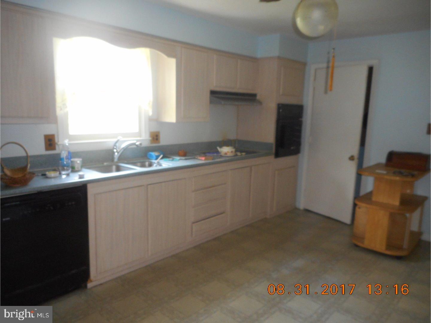 6 Valley Forge Road New Castle, DE 19720 - Photo 8 of 13 a kitchen with a sink cabinets and window