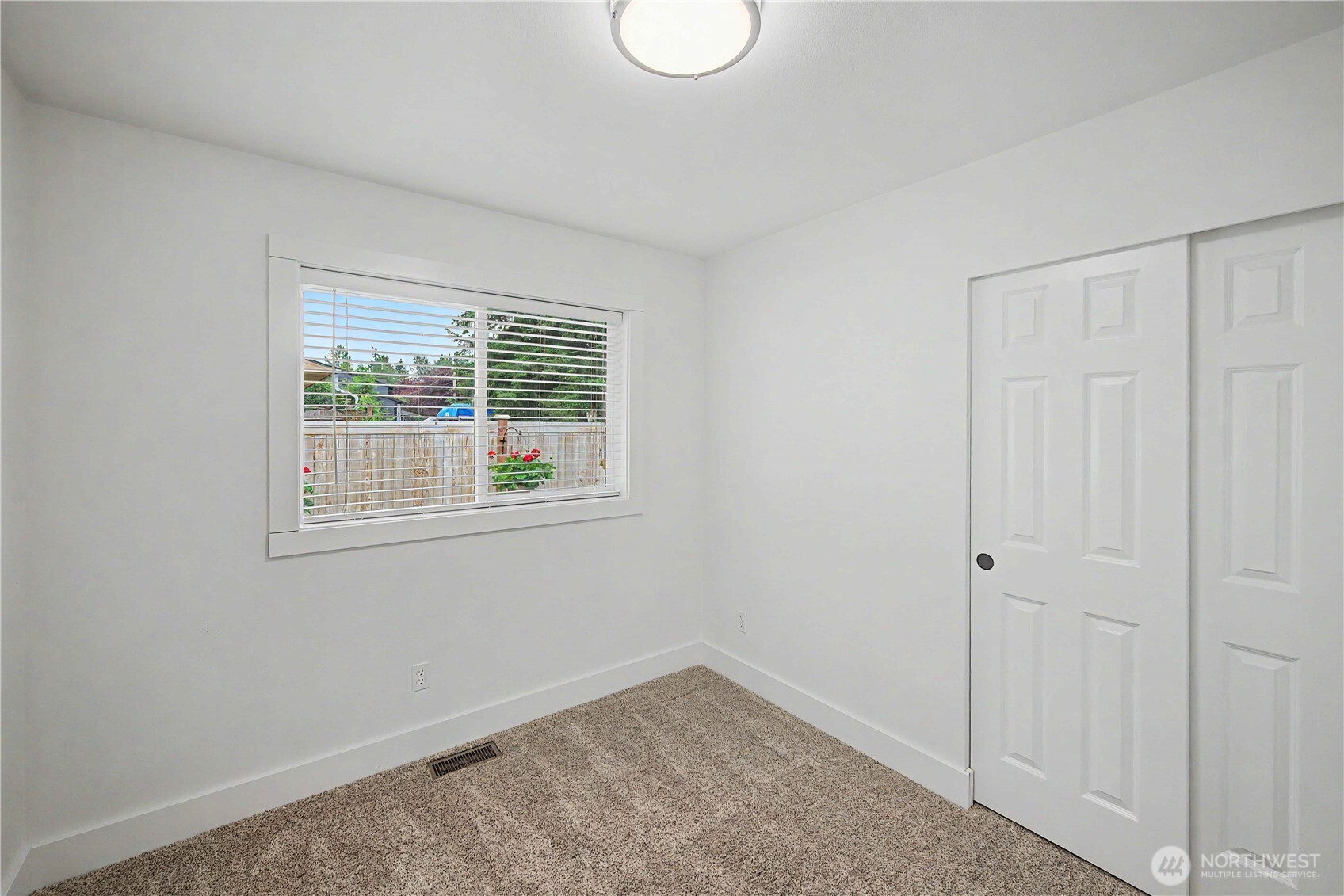 20919 Ronning Road Arlington, WA 98223 - Photo 17 of 28 a view of an empty room with window