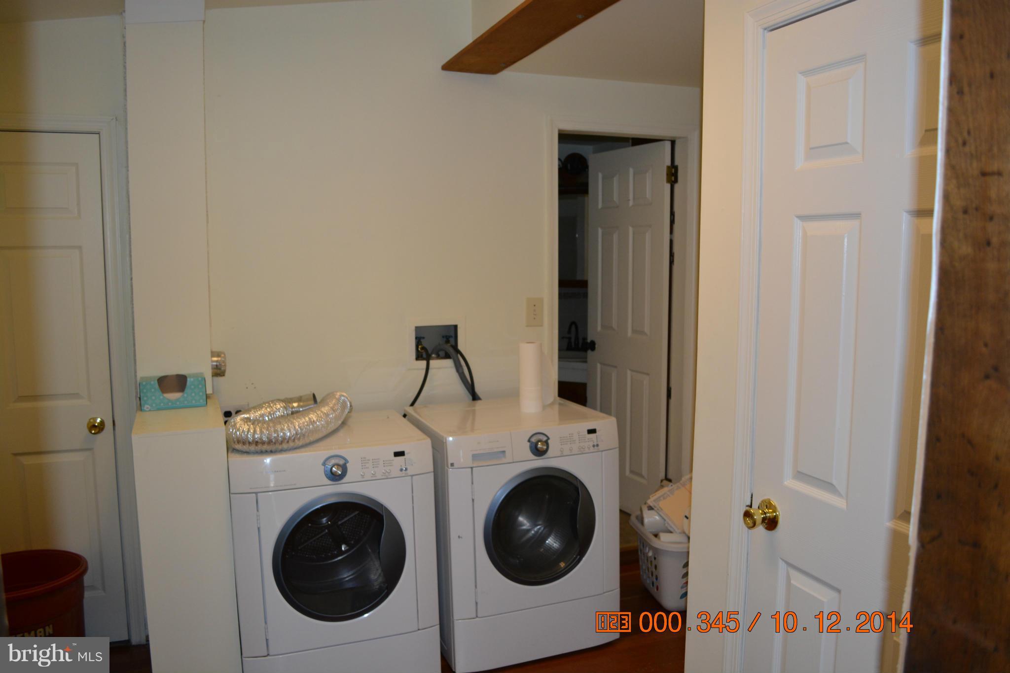 13106 Mercersburg Road Clear Spring, MD 21722 - Photo 11 of 11 a utility room with dryer and washer