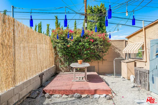 a view of a backyard with plants