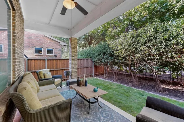 a outdoor living space with furniture and a potted plant