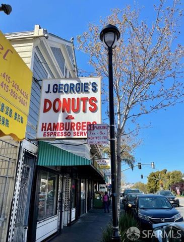 a front view of a building with a street