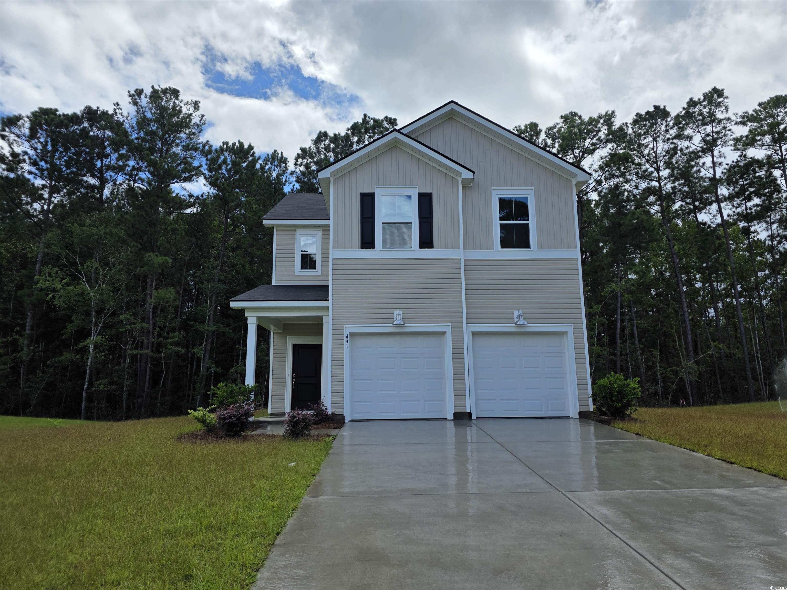 441 Falling Leaf Loop Myrtle Beach, SC 29588 - Photo 1 of 14 View of front of home featuring concrete driveway,