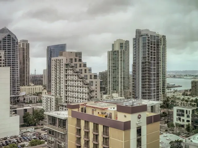 a city view with tall buildings