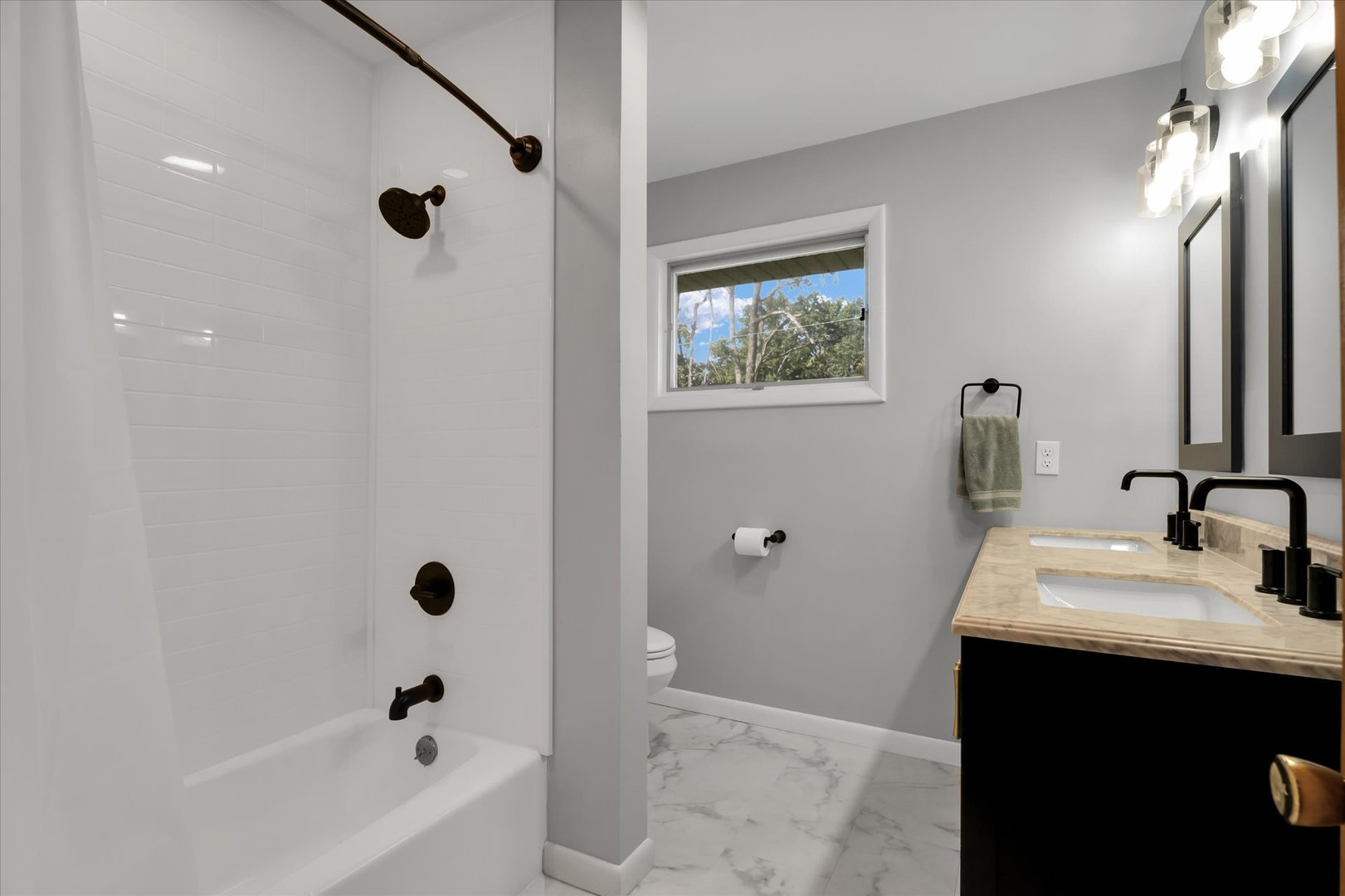 1110 Silver Street Urbana, IL 61801 - Photo 17 of 40 a bathroom with a sink and a mirror