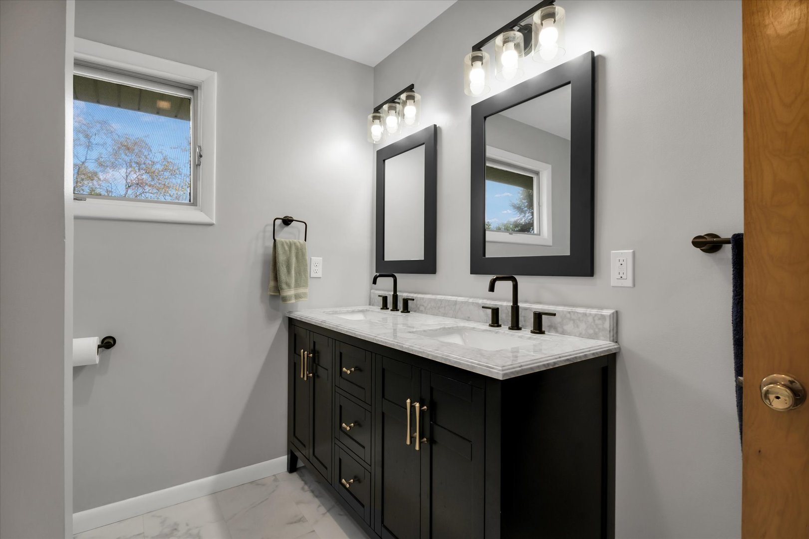 1110 Silver Street Urbana, IL 61801 - Photo 18 of 40 a bathroom with a double vanity sink and a mirror