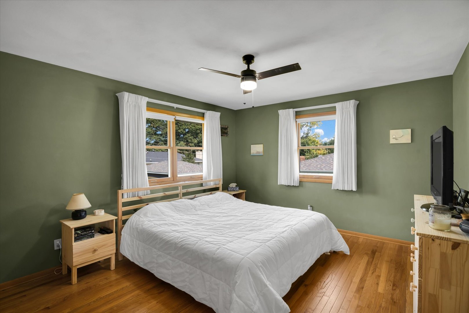 1110 Silver Street Urbana, IL 61801 - Photo 19 of 40 a bedroom with a bed and a flat screen tv