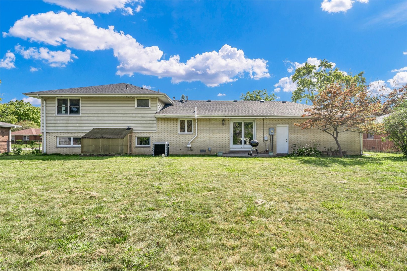 1110 Silver Street Urbana, IL 61801 - Photo 38 of 40 a view of a house with backyard and garden