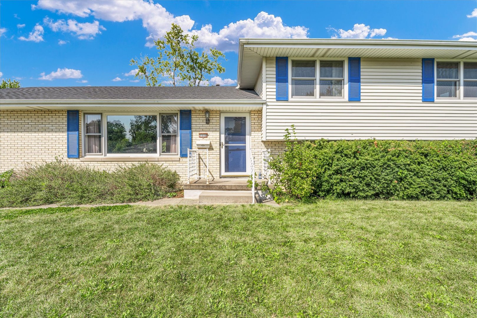 1110 Silver Street Urbana, IL 61801 - Photo 4 of 40 a view of a house with backyard and garden
