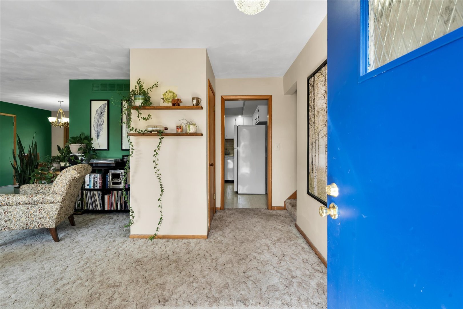 1110 Silver Street Urbana, IL 61801 - Photo 5 of 40 a view of a livingroom with furniture and a hallway